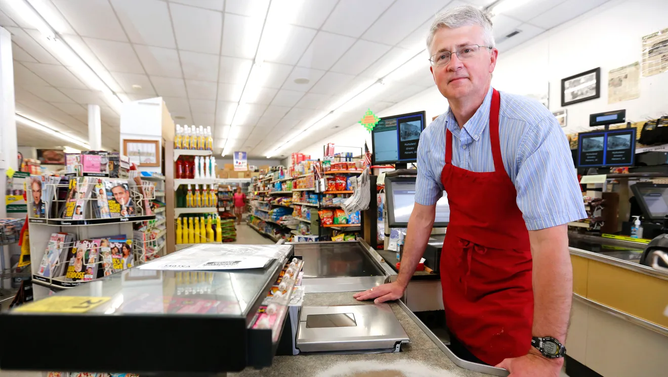 Tom Mulholland at the counter